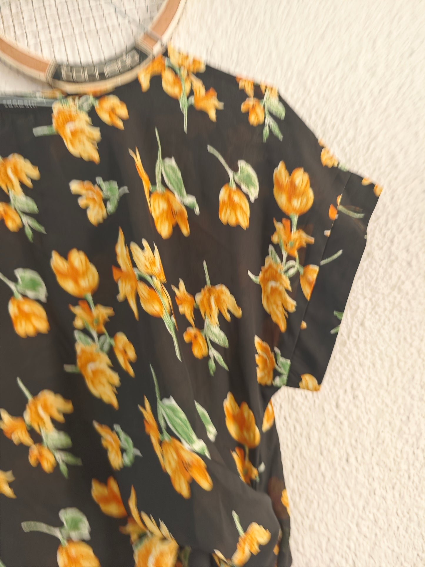 Top fleuri transparent